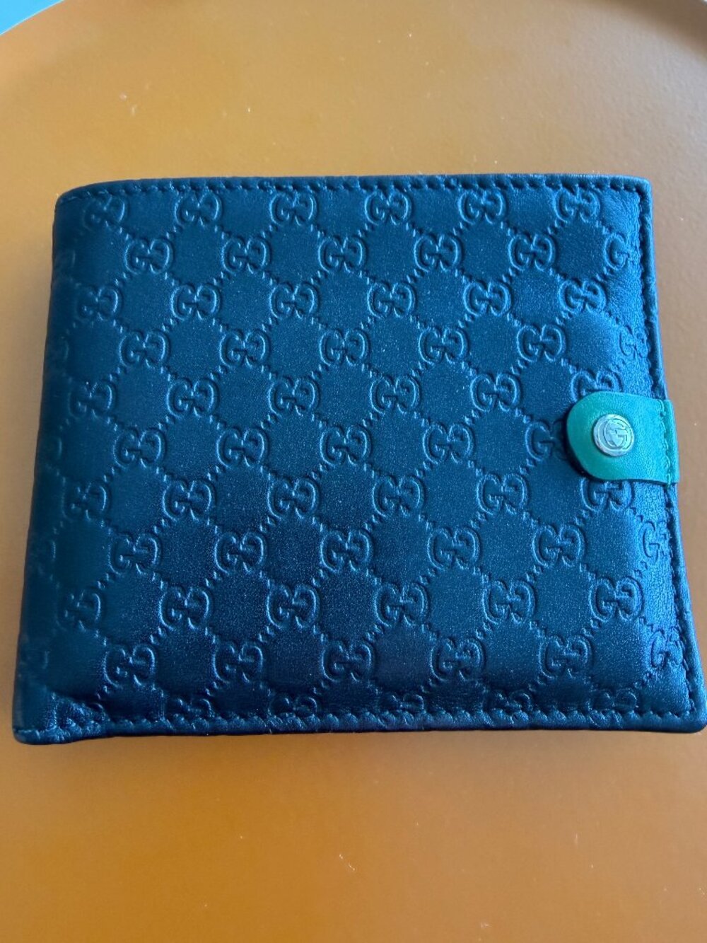 Gucci Micro Guccissima Leather Bi Fold Wallet